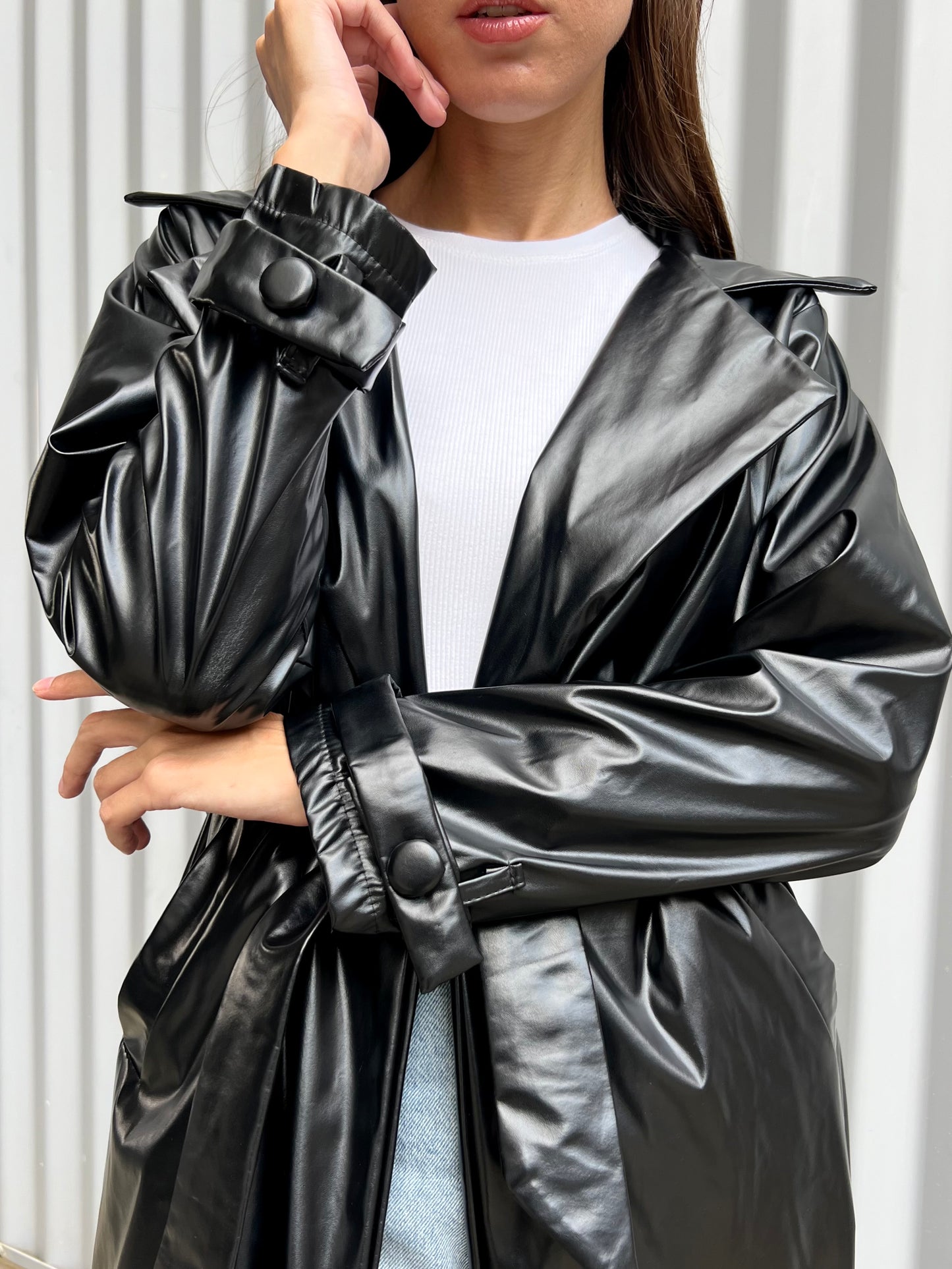 Belted leather coat in black